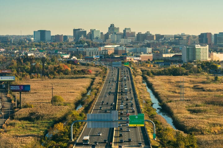 Skyline view of the city of Wilmington DE and i-95 highway showing Commuter Routes